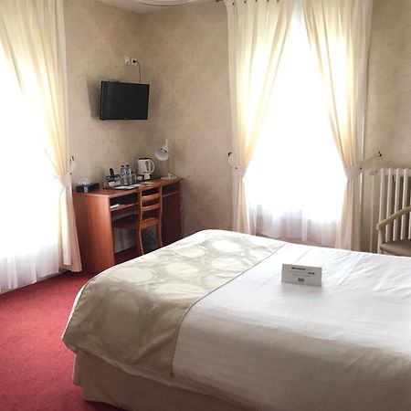 Logis Hotel & Restaurant La Paix Le Nouvion-en-Thierache ภายนอก รูปภาพ